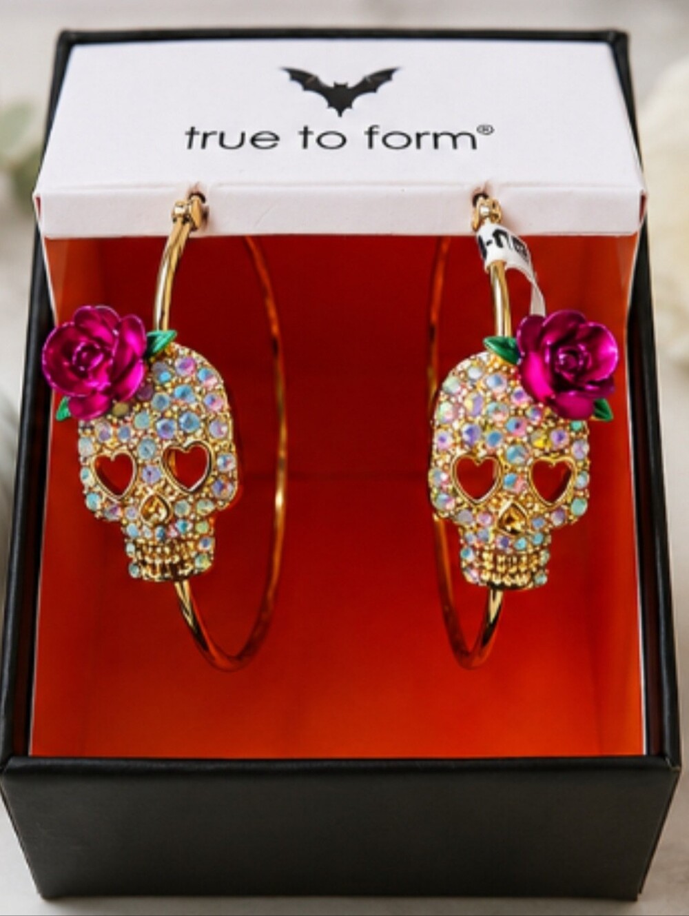 True to Form Gold Skull Hoop Earrings with Fuchsia Crystal Rose